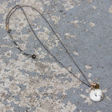 Stamped Metals Collection: Oxidized sterling silver medium stamped disc with 14K goldfill with whiskey quartz