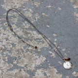 Stamped Metals Collection: Oxidized sterling silver medium stamped disc with 14K goldfill with garnet