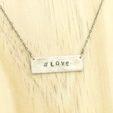 Hand-stamped hashtag necklace