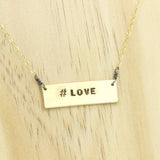 Hand-stamped hashtag necklace