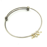 Mixed metal expandable bangle bracelet