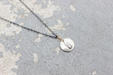 Stamped Metals Collection: Oxidized sterling silver small stamped disc with 14K goldfill